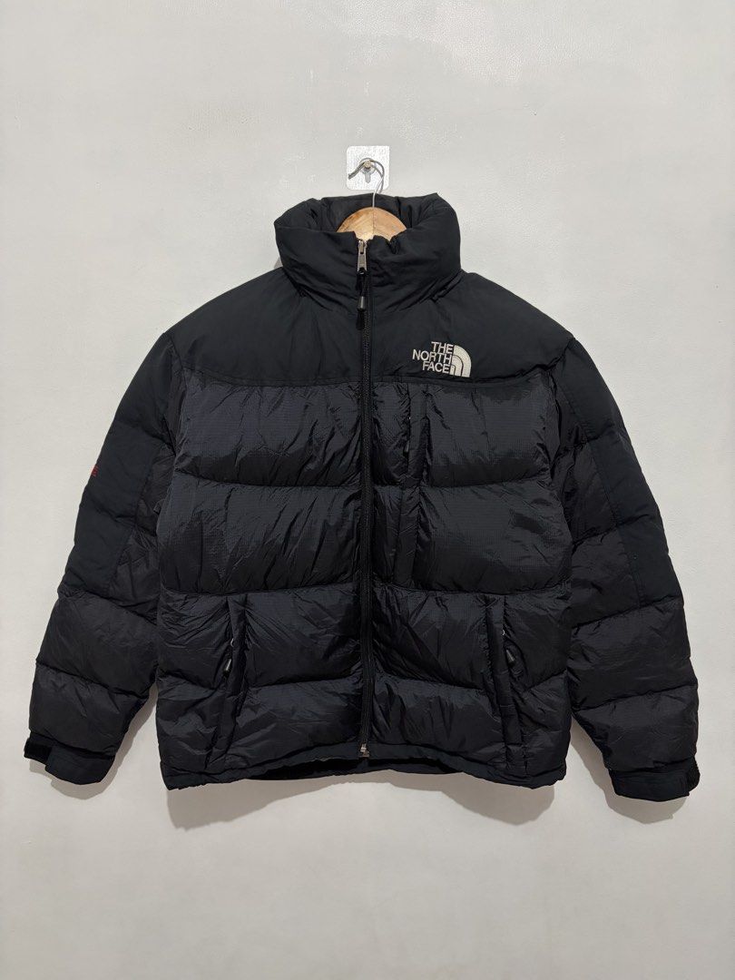 The North Face Summit Series 700 Down Puffer Jacket (Category: Coats, Jackets and Outerwear) located in Quezon City. Submitted by Tyler_brown (Listing ID 1470697050, Image 1). Description: - Authentic The North Face Summit Series puffer jacket - Color: Classic black - Insulation: Premium goose down fill - Fit/Size: Men's Medium (tag attached) - Details: High stand-up collar, front zip closure, and embroidered branding on chest and back shoulder -
