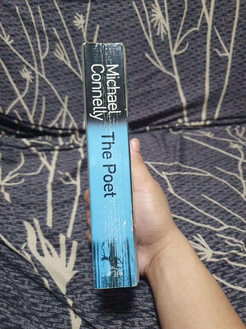 The Poet by Michael Connelly (Category: Storybooks) located in Bulacan. Submitted by anthony_b01 (Listing ID 1470615678, Image 2). Description: - The Poet by Michael Connelly - Mass Market Paperback - 30 pesos only Rfs: Decluttering space Location: SJDM, Bulacan Courier: Lalamove or J&T delivery.
