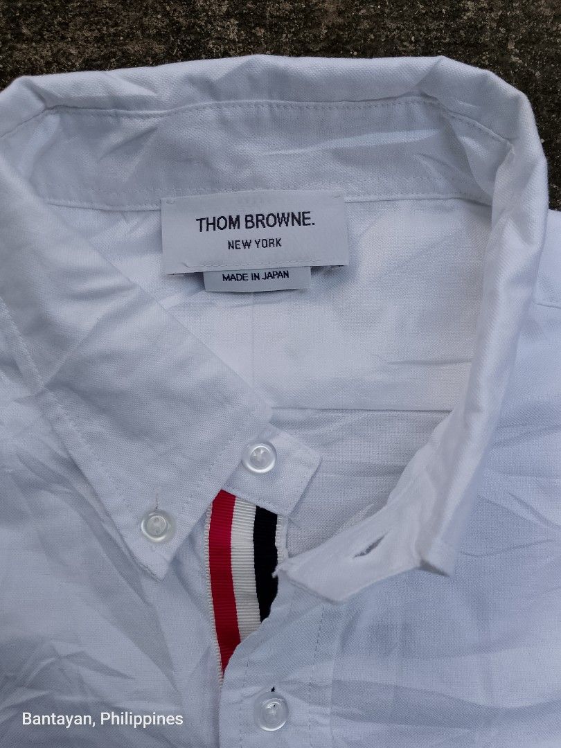 THOM BROWNE BUTTON DOWN LONGSLEEVE (Category: Formal Shirts) located in Bantayan. Submitted by rare.palautog (Listing ID 1470641036, Image 2). Description: THOM BROWNE BUTTON DOWN LONGSLEEVE SIZE 3 W 22 L 31.5 LONG BACK 32 NO FLAWS DM SA INTERESTED 📩 CEBU LOCATION 📌.