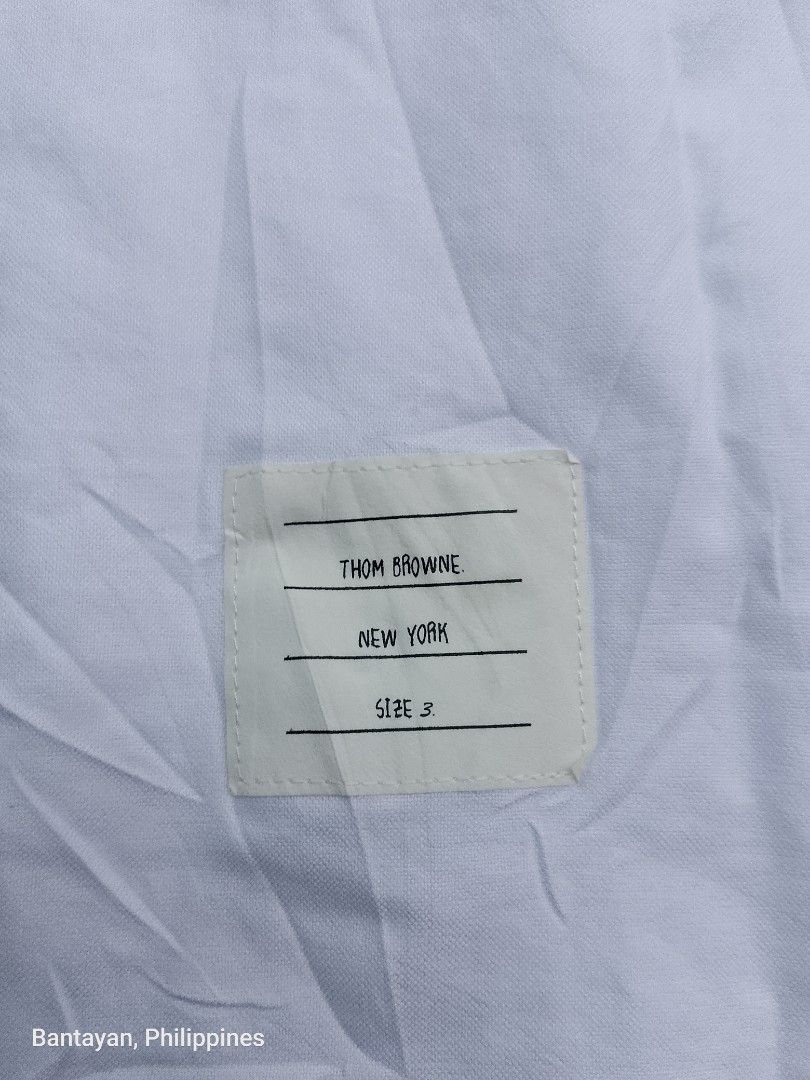 THOM BROWNE BUTTON DOWN LONGSLEEVE (Category: Formal Shirts) located in Bantayan. Submitted by rare.palautog (Listing ID 1470641036, Image 3). Description: THOM BROWNE BUTTON DOWN LONGSLEEVE SIZE 3 W 22 L 31.5 LONG BACK 32 NO FLAWS DM SA INTERESTED 📩 CEBU LOCATION 📌.