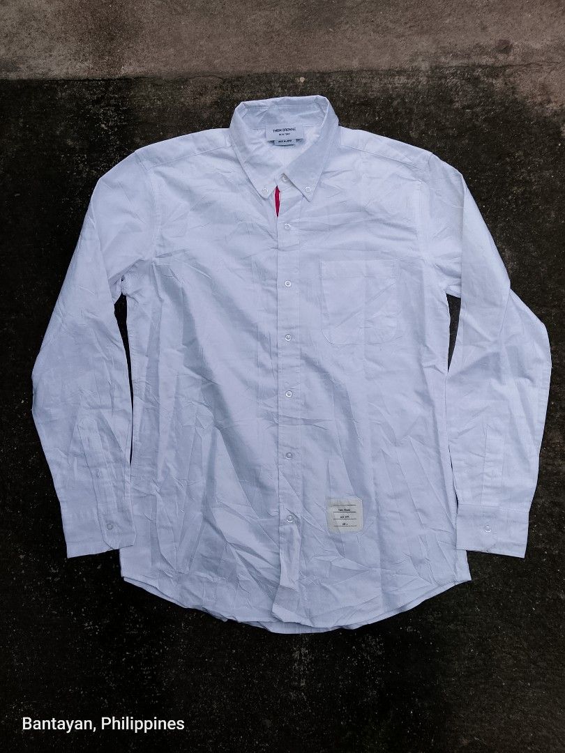 THOM BROWNE BUTTON DOWN LONGSLEEVE (Category: Formal Shirts) located in Bantayan. Submitted by rare.palautog (Listing ID 1470641036, Image 1). Description: THOM BROWNE BUTTON DOWN LONGSLEEVE SIZE 3 W 22 L 31.5 LONG BACK 32 NO FLAWS DM SA INTERESTED 📩 CEBU LOCATION 📌.