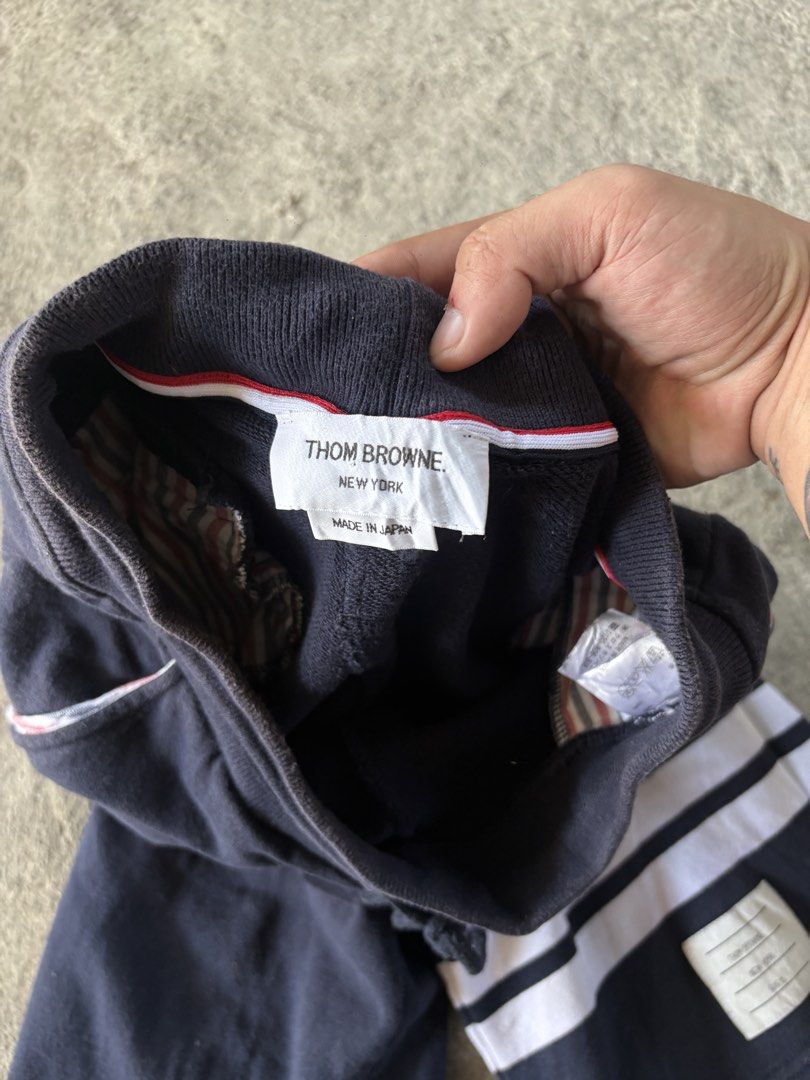 Thom Browne Classic 4 Bar Sweatshorts (Category: Luxury Apparel) located in Cabiao. Submitted by thelifeofgelo (Listing ID 1470583652, Image 3). Description: Thom Browne Classic 4 Bar Sweatshorts Size: 0 (fits Small) Waist: 26-30 Length: 22 Leg opening: 9 Good condition Price: 450 + shipping fee.