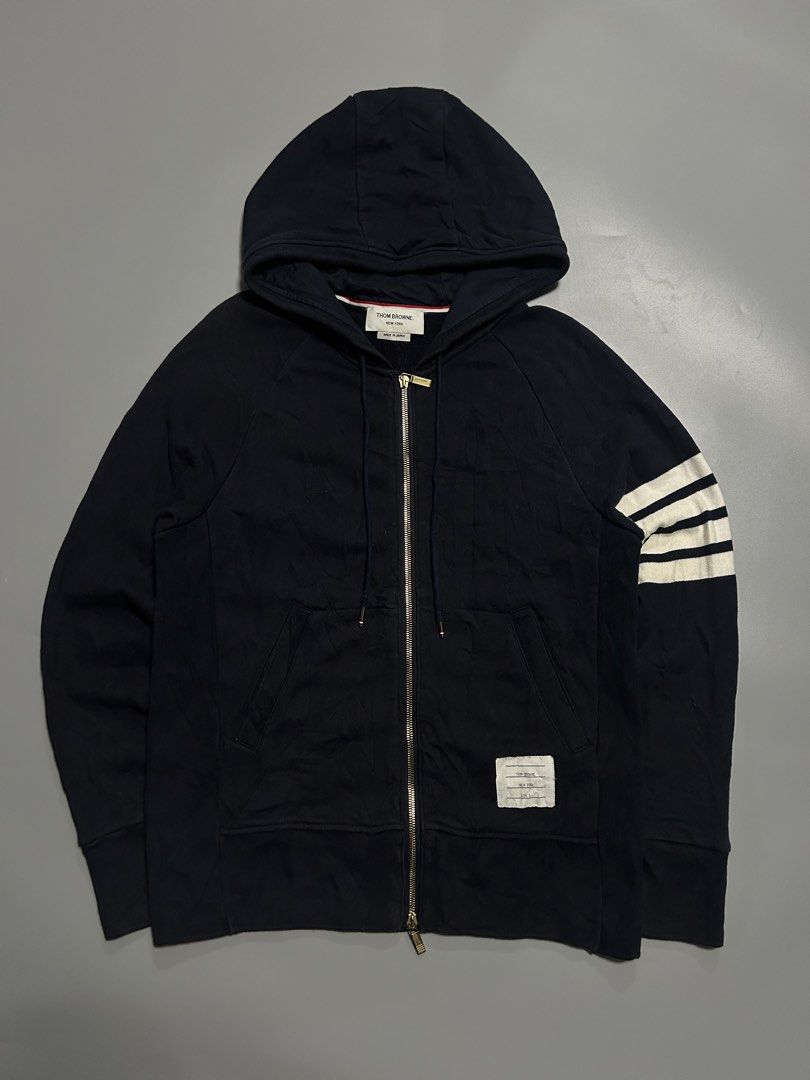 Thom Browne Navy Engineered 4-bar Classic Full-zip Hoodie (authentic) (Category: Luxury Apparel) located in Trece Martires City. Submitted by flip_flips (Listing ID 1470696404, Image 1). Description: Thom Browne Navy Engineered 4-bar Classic Full-zip Hoodie (authentic) -Dimes: 21 width 26.5 length -Like new condition -9.7/10 color rate -issue: none.