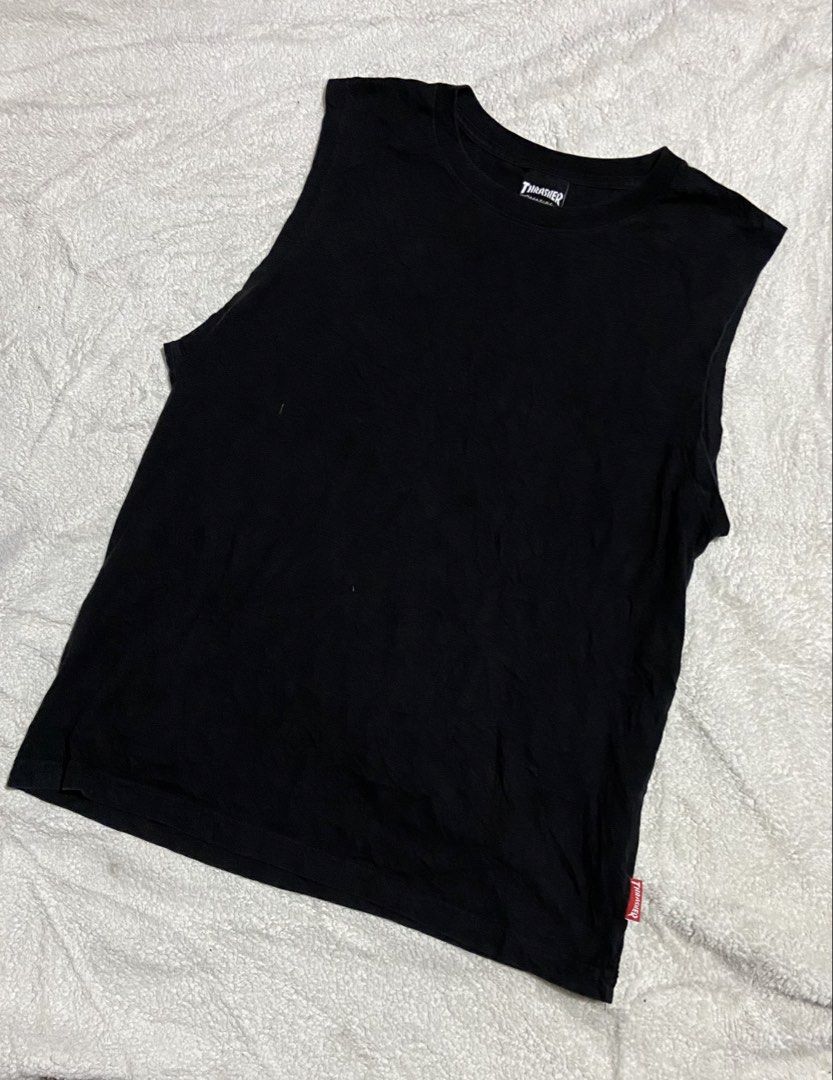 Thrasher Flame Logo Black Tank Top (Category: Activewear) located in Polomolok. Submitted by tnecniv311 (Listing ID 1470671811, Image 1). Description: - Brand: Thrasher Magazine - Color: Black with purple/blue flame graphic - Size: Medium - Details: Small red Thrasher logo label stitched near bottom hem - Material: Comfortable cotton, normal fit - Condition: Great piece for skating and casual streetwear.
