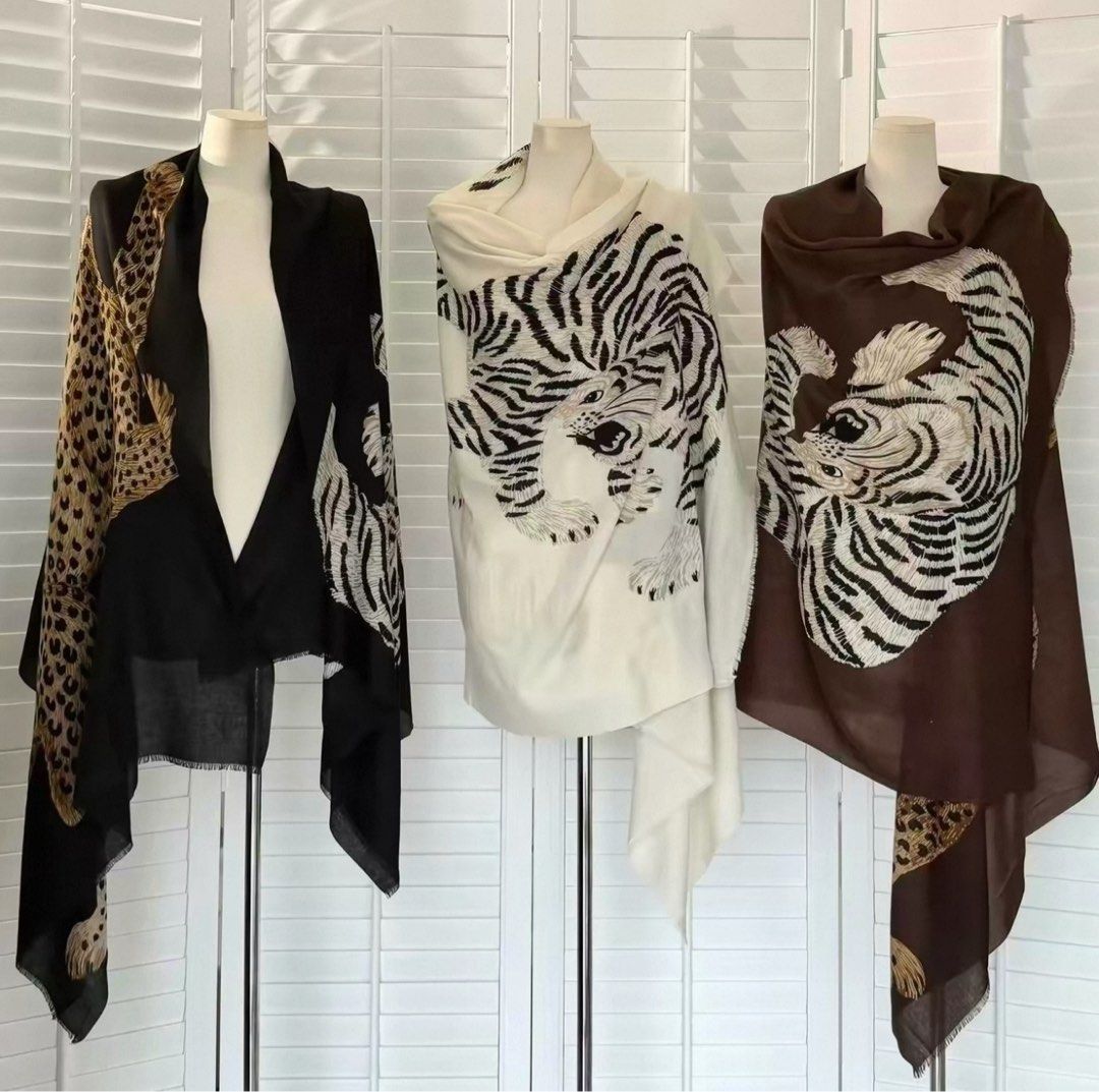 Tiger and Leopard Print Long Scarf Shawl (Category: Scarves) located in Calapan. Submitted by kawushii (Listing ID 1470695542, Image 1). Description: - Statement tiger and leopard print design - Soft, beautiful draping fabric with fringe edges - Versatile styling: wear as a cozy shawl or wrap around coats - Ideal for cooler weather - Available in 2 colors: black and white 📍Taguig manila.