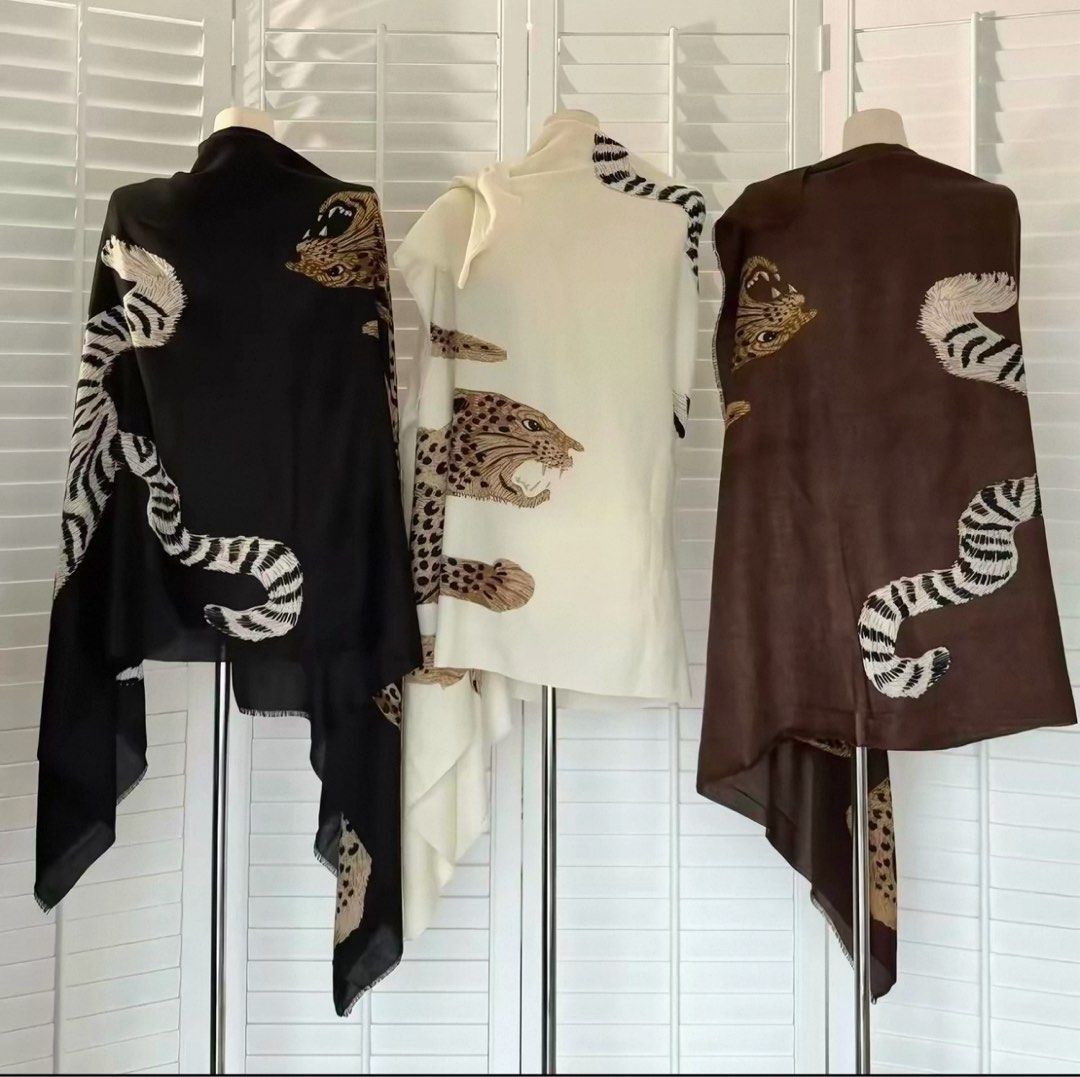 Tiger and Leopard Print Long Scarf Shawl (Category: Scarves) located in Calapan. Submitted by kawushii (Listing ID 1470695542, Image 2). Description: - Statement tiger and leopard print design - Soft, beautiful draping fabric with fringe edges - Versatile styling: wear as a cozy shawl or wrap around coats - Ideal for cooler weather - Available in 2 colors: black and white 📍Taguig manila.