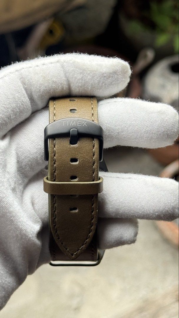 Timex Tide Temperature Compass Watch (Category: Men's Watches) located in Manila. Submitted by junjun12356 (Listing ID 1470703181, Image 3). Description: - Brand/Model: Timex Tide Temp Compass watch - Condition: Worn only a few times, extremely clean crystal and leather strap - Dial & Case: Olive green dial housed in a dark gunmetal case - Strap: Brown leather strap with matching buckle - Features: Sub-dials for tide, temperature, and compass rea