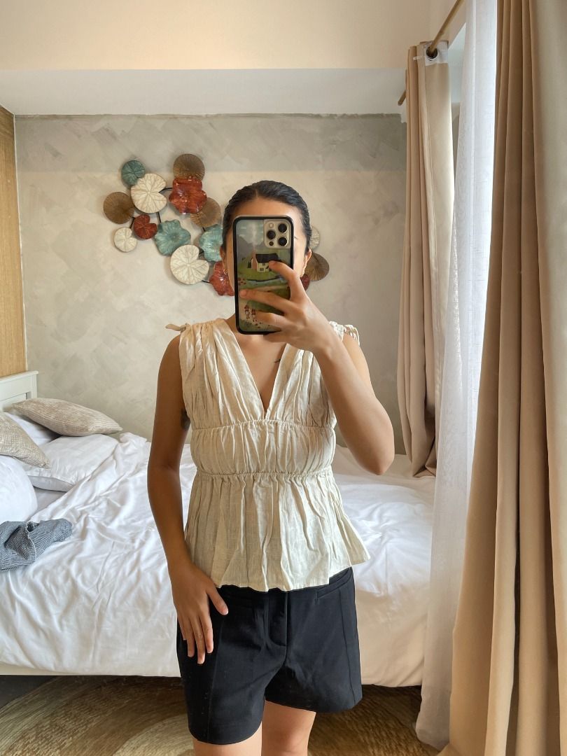 Tira Studio Linen Gathered Sleeveless Top (Category: Sleeveless) located in Quezon City. Submitted by everythingmustgo__ (Listing ID 1470674043, Image 3). Description: Tira Studio Linen Gathered Sleeveless Top (from BKK 🇹🇭) - brand new with tags - size: free size - can fit up to medium frame ‼️ firm with price. low ballers will not be entertained ‼️.