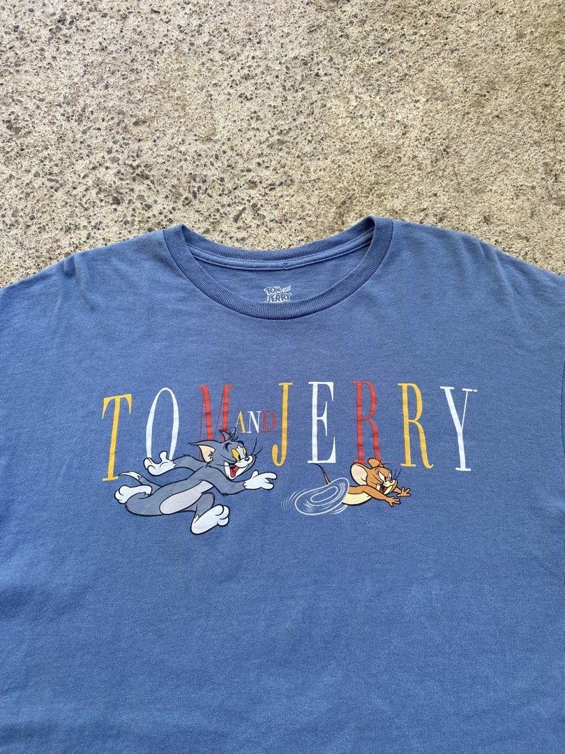 Tom And Jerry Graphic Tee (Category: Tshirts & Polo Shirts ) located in Bayombong. Submitted by fliptique (Listing ID 1470571657, Image 3). Description: Tom And Jerry Graphic Tee Excellent Condition Size : Large Dimes : 21”x28.5” Shoulder To Shoulder : 20.5” Sleeve Length : 7.5” Hem : 22” Color Rate : 10 Issue : ❌❌❌ ₱350 + sf .