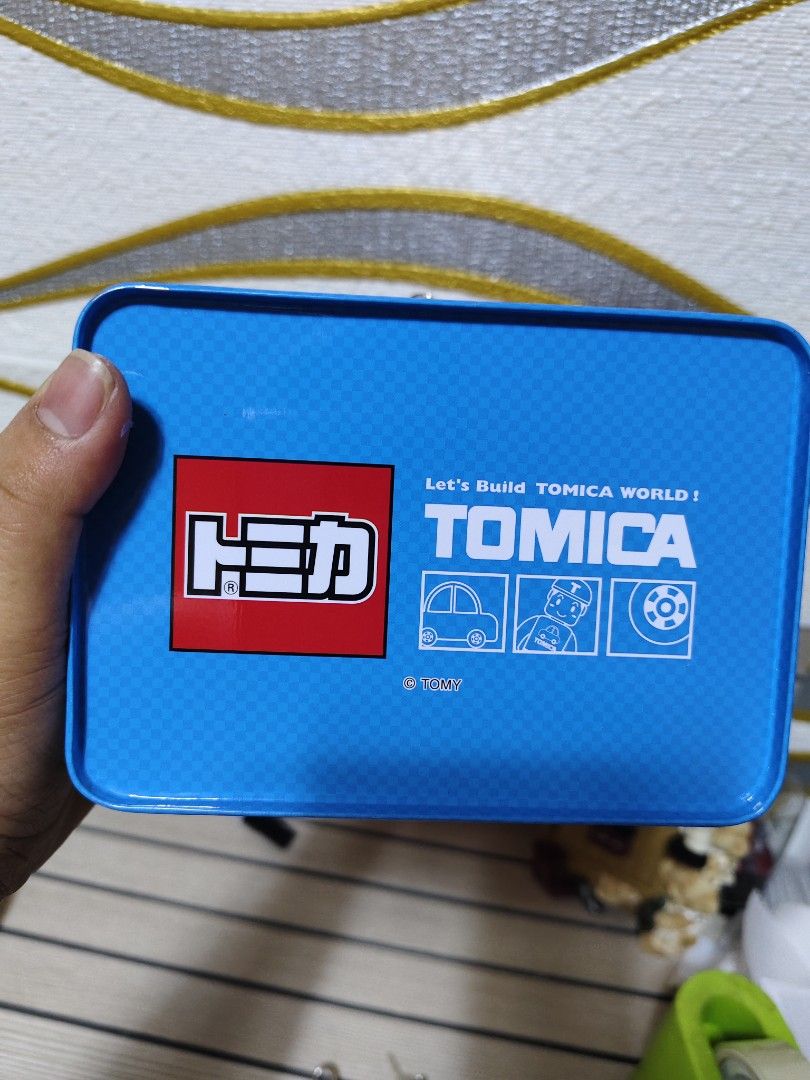 Tomica coin bank (Category: Vintage Collectibles) located in Baguio. Submitted by syakniseph1105 (Listing ID 1470584244, Image 2). Description: Tomica coin bank with padlock and key likenew.