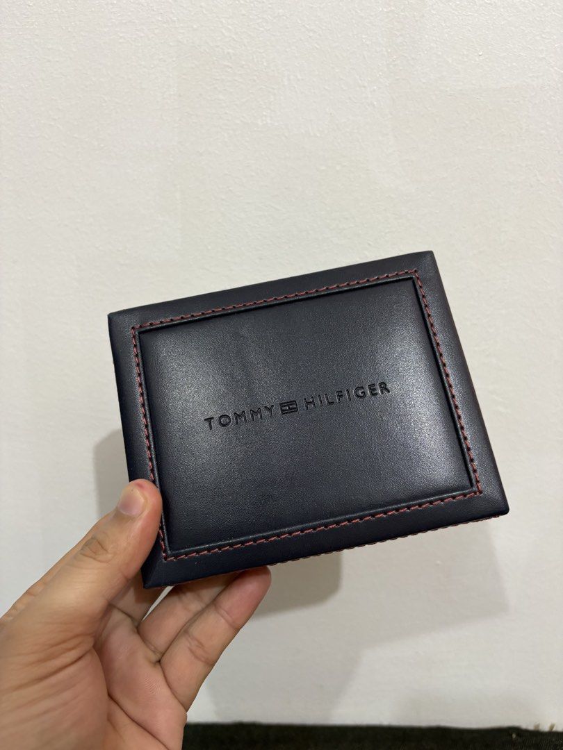 Tommy Hilfiger Brown Leather Wallet & Valet Box Set (Category: Wallets & Card Holders) located in Makati City. Submitted by bryyyyyyyy16 (Listing ID 1470664611, Image 1). Description: - Brand new Tommy Hilfiger brown leather wallet with matching valet storage box - Built-in RFID protection to keep your cards secure - Multiple card slots and a convenient ID window - Made in India - Style code: 31HP220062 - Comes in original box, perfect for giftin
