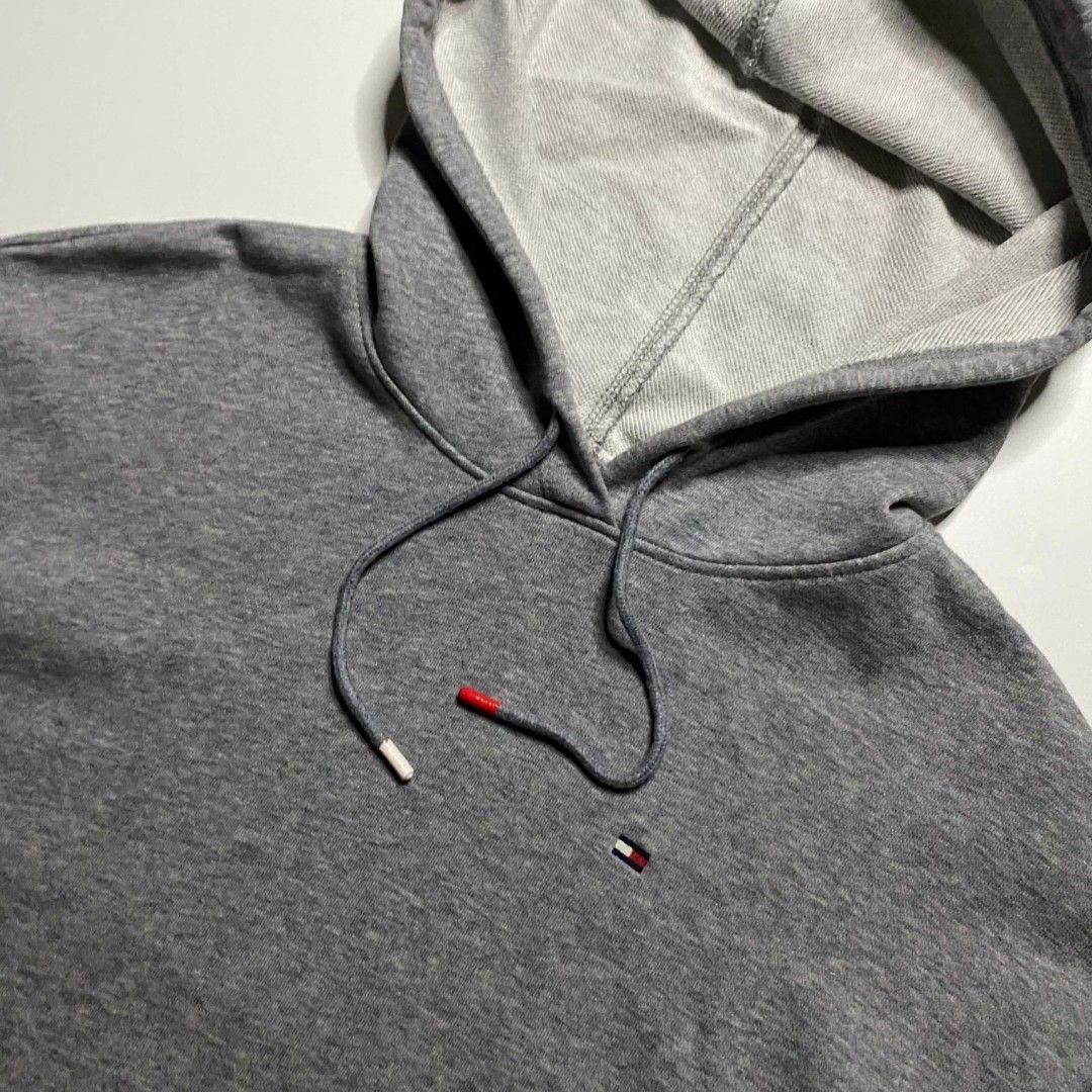 Tommy Hilfiger Heather Gray Hoodie (Category: Coats, Jackets and Outerwear) located in San Pablo. Submitted by refitsph (Listing ID 1470709792, Image 3). Description: - Width: 22.5 - Length: 25.5 - Legit / Authentic - Flawless - Already Washed and Ready to Wear.