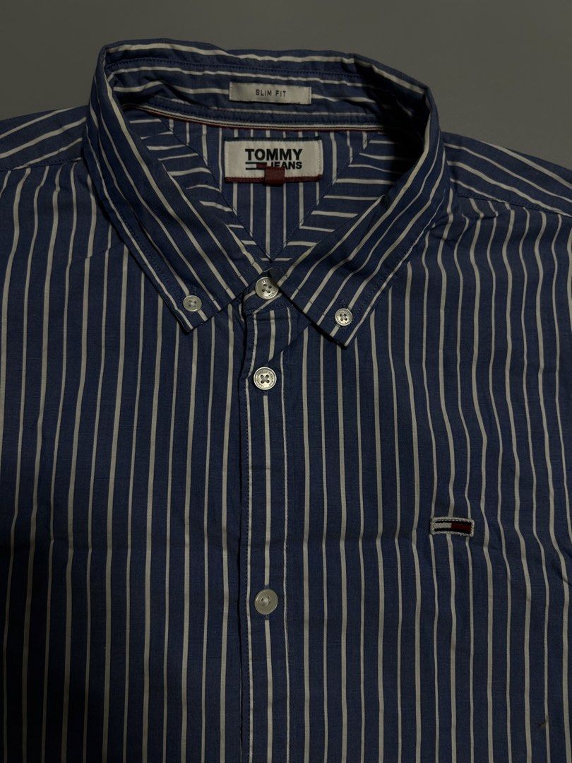 Tommy hilfiger pinstripe classic button down polo (authentic) (Category: Formal Shirts) located in Trece Martires City. Submitted by flip_flips (Listing ID 1470699206, Image 2). Description: Tommy hilfiger pinstripe classic button down polo (authentic) -Dimes: 22 width 30 length -Excellent condition -9.5/10 color rate -issue: none.