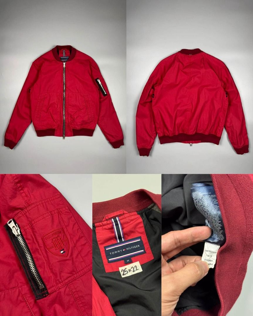 Tommy Hilfiger Red Bomber Jacket (Category: Coats, Jackets and Outerwear) located in Baguio. Submitted by stockedclothing047 (Listing ID 1470565171, Image 1). Description: TOMMY HILFIGER BOMBER JACKET RED (EXCELLENT CONDITION) MEDIUM (25L X 22W) 1080 - Brand: Tommy Hilfiger - Color: Bright red with black inner lining - Size: M (Measurements: 25" x 22" as shown in tag) - Style: Classic zip-up bomber jacket with ribbed collar, cuffs, and hem - Deta