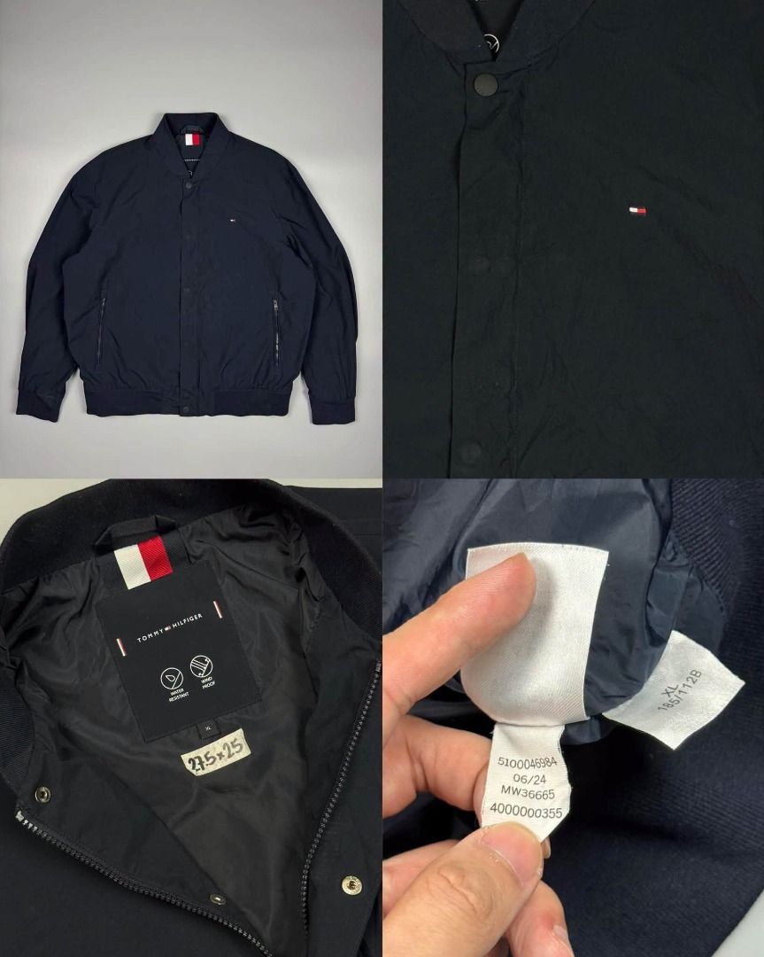 TOMMY HILFIGER WATER RESISTANT JACKET (Category: Coats, Jackets and Outerwear) located in Baguio. Submitted by stockedclothing047 (Listing ID 1470565223, Image 1). Description: TOMMY HILFIGER WATER RESISTANT JACKET (EXECLLENT CONDITION) XLARGE (27.5L X 25W) 1280 - Brand: Tommy Hilfiger - Style: Bomber jacket - Color: Dark navy blue - Size: XL - Details: Snap button front, side zip pockets, quilted interior lining - Branding: Classic small embroid