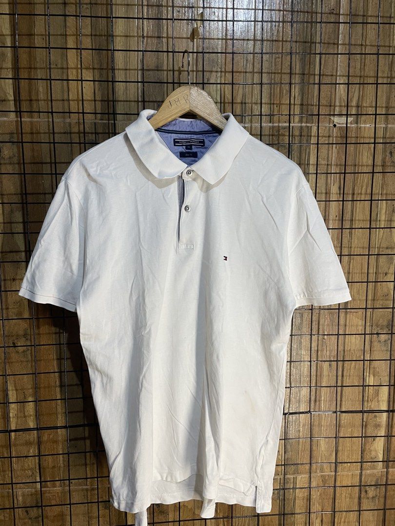 Tommy Hilfiger white polo (Category: Tshirts & Polo Shirts ) located in Pateros City. Submitted by toogood.mnl (Listing ID 1470642507, Image 1). Description: Tommy Hilfiger white polo W-22 L-28 Need wash Excellent condition .