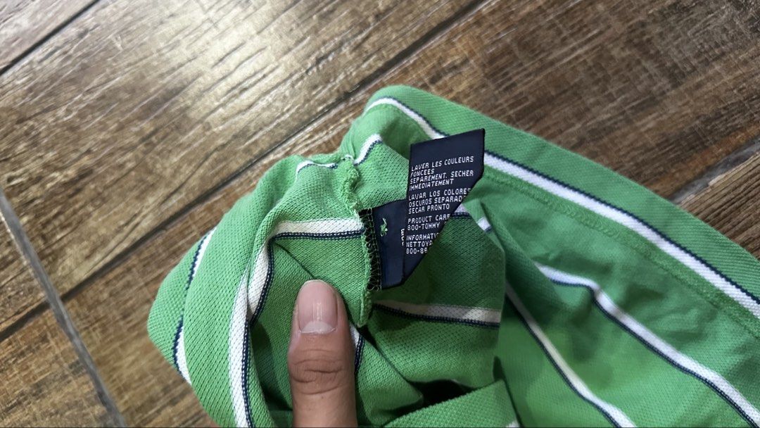 TOMMY HILFINGER STRIPE (Category: Tshirts & Polo Shirts ) located in Manila. Submitted by urban-vintage_2 (Listing ID 1470564929, Image 3). Description: ISSUE: NONE ( NEED WASH ) MOP :GCASH ( NO COD ) SHIP VIA : LALAMOVE & J&T LOCATION : PASIG CITY LENGTH : 30 WIDTH : 23.