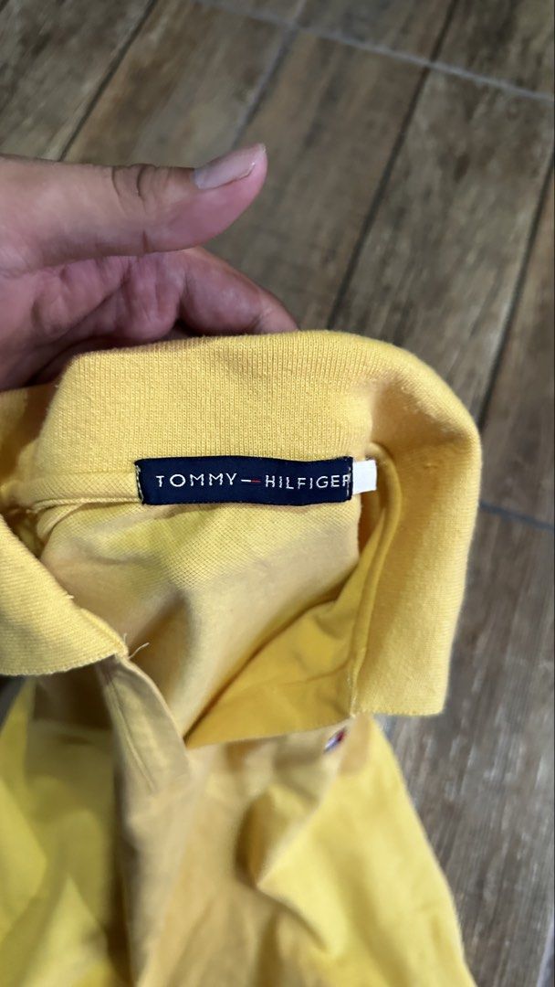 TOMMY YELLOW POLO (Category: Shirts) located in Manila. Submitted by urban.vintage (Listing ID 1470612870, Image 2). Description: ISSUE: NONE (NEED WASH) MOP :GCASH (NO COD) SHIP VIA: LALAMOVE & J&T LOCATION: PASIG CITY LENGTH: 23 WIDTH : 22.