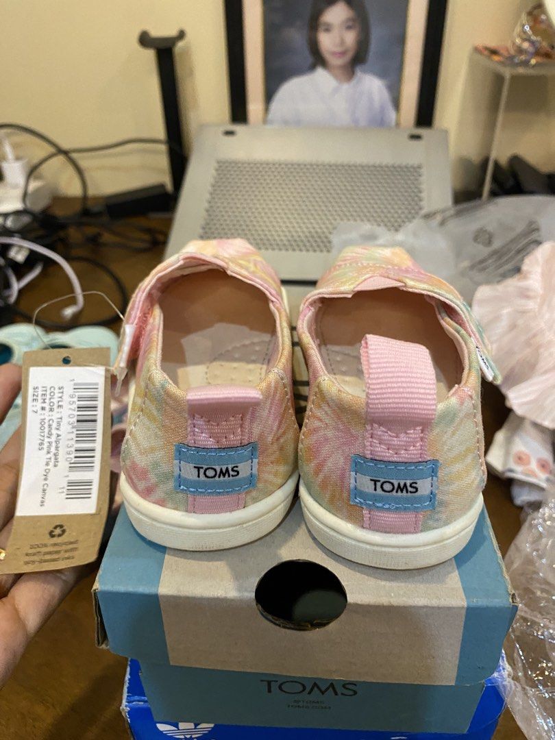 TOMS Tiny Alpargata Candy Pink Tie Dye Canvas Size 7 (Category: Babies & Kids Fashion) located in Santa Rosa. Submitted by hoardqueensdeclutter (Listing ID 1470676864, Image 2). Description: - Brand: TOMS - Style: Tiny Alpargata - Color: Candy Pink Tie Dye - Size: Size 7 (EUR 23.5, 14 CM) - Features: Slip-on style with heel pull tab - Condition: Brand new, never used, pristine condition - Inclusions: Original box and tag attached.