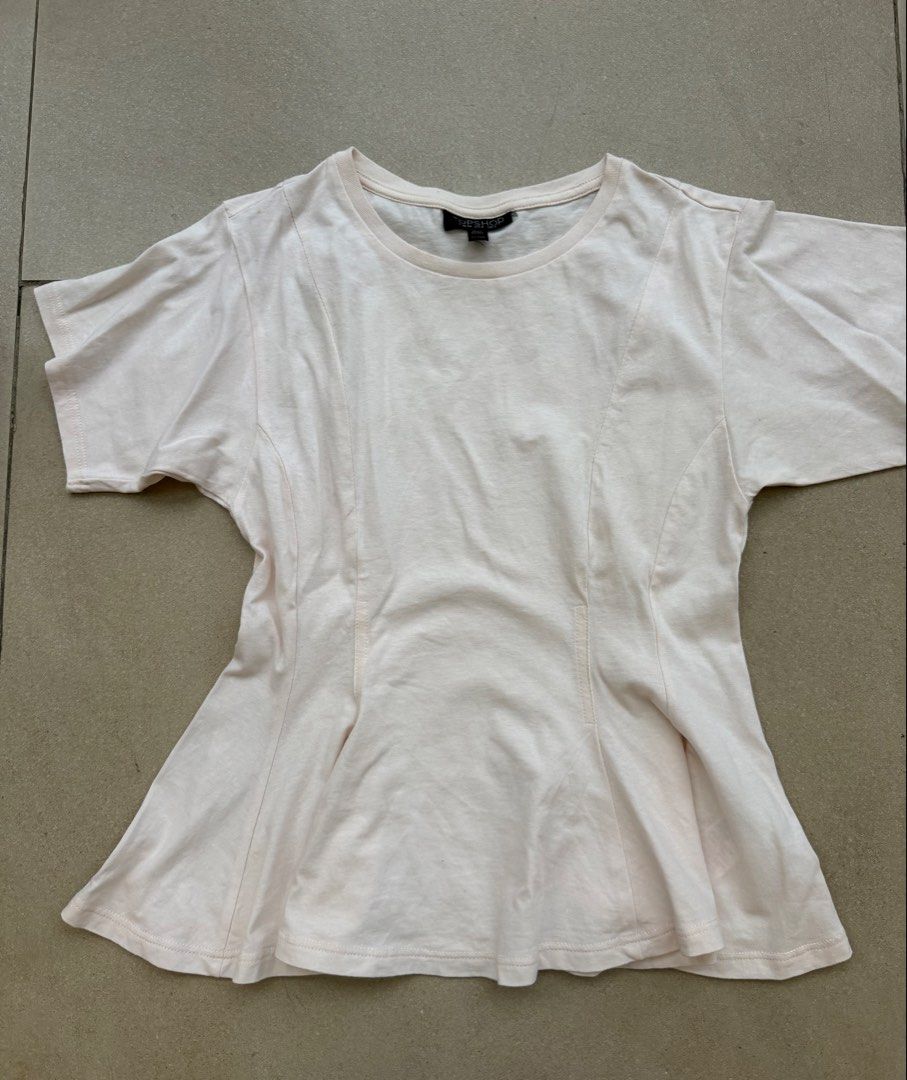 Topshop panel peplum shirt xs (Category: Blouses) located in Quezon City. Submitted by closet.cha (Listing ID 1470596225, Image 2). Description: *PLEASE READ DESCRIPTION, DO NOT MAKE AN OFFER IF YOU ARE NOT SURE* Size: XS Light pink color Good condition No return no exchange No haggle and low baller offers. No other photos or when worn for flat lays. No Meet-Ups No Cash on Delivery No Pera Padala at the moment. 🖊Please pay on time. No to joy res