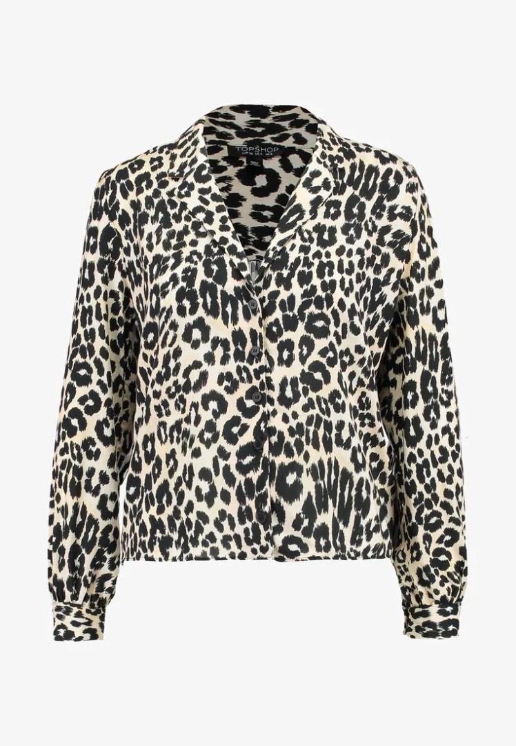 Topshop Petite Leopard Print Button Down Blouse Size UK 6 (Category: Blouses) located in Cebu City. Submitted by _t.rix (Listing ID 1470573273, Image 1). Description: - Brand: Topshop Petite - Pattern: All-over black and cream leopard print - Size: US 2, UK 6, EUR 34 - Fit: Relaxed fit with a notched lapel collar - Details: Long sleeves with button cuffs - Origin: Made in Turkey - Condition: Excellent / Ready to wear.