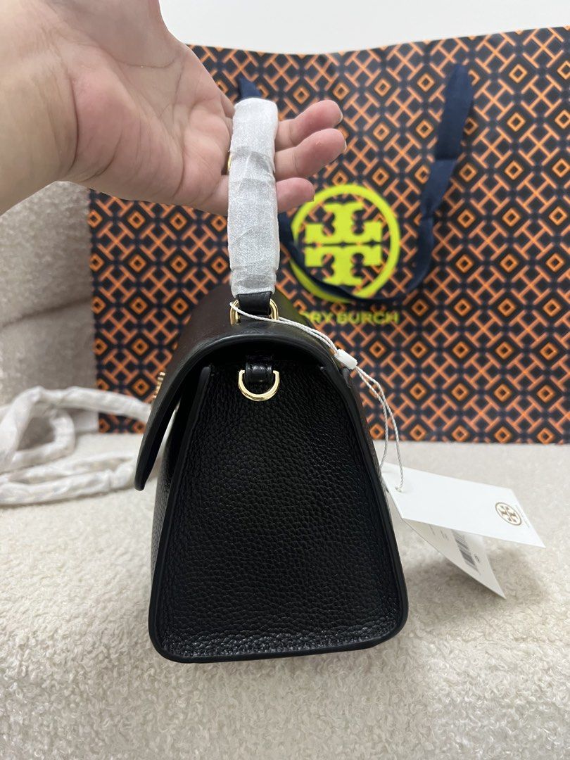 Tory Burch Britten Top Handle Bag Black (Category: Luxury Bags & Wallets) located in Abulug. Submitted by jamiecammie (Listing ID 1470605697, Image 3). Description: .