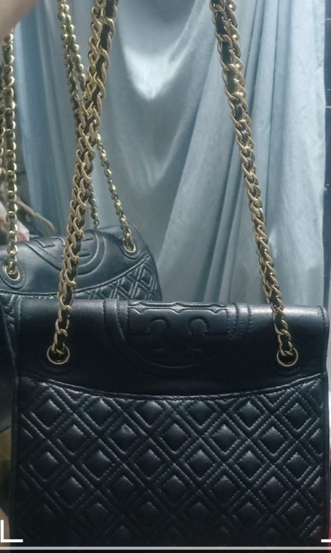 Tory Burch Fleming Convertible Shoulder Bag (Category: Announcements) located in Apalit. Submitted by missannefashionboutique (Listing ID 1470702589, Image 2). Description: Tory Burch Fleming Convertible Shoulder Bag crafted in quilted leather with gold-tone hardware and the signature embossed Double T logo..