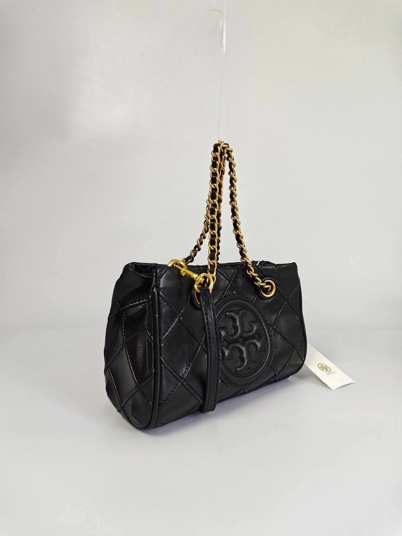 Tory Burch Fleming Mini Soft Chain Tote in black. (Category: Cross-body Bags) located in Quezon City. Submitted by rnjcollections_eleganteph (Listing ID 1470593151, Image 3). Description: with paperbag, dustbag, tag and warranty.