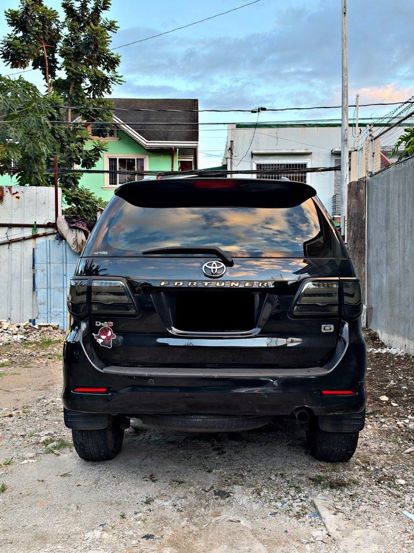 Toyota Fortuner G Variant Auto (Category: Used Cars) located in Quezon City. Submitted by spirit.yatoro (Listing ID 1470671289, Image 2). Description: 🚘 FOR SALE TOYOTA FORTUNER 2012 G A/T DIESEL 💰 ₱535,000 ONLY ✅ 101K Mileage Only ✅ All Leather Seats ✅ Lenovo Head Unit & Dashcam ✅ VLAND Taillights ✅ TRD Front Grille ✅ Registered Until 2027 ✅ Complete Original Papers ✅ 2 Original Keys ✅ Bought from First Owner ❌Issue: Scratches (Very normal for