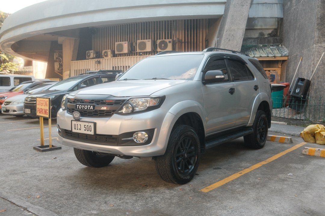 Toyota Fortuner G Auto (Category: Used Cars) located in Quezon City. Submitted by kptcariasosbcm (Listing ID 1470707767, Image 1). Description: TOYOTA FORTUNER 2012 G - Selling my personal car - Owner seller - 2nd owner - Well maintained VEHICLE DETAILS: * Year Model: 2012 * Variant: G * Engine: 2.7L Gasoline * Drivetrain: 4x2 * Transmission: Automatic * Mileage: 110k * Color: Silver Metallic (Original Color - Dark Grey) * Registered until 2027 *
