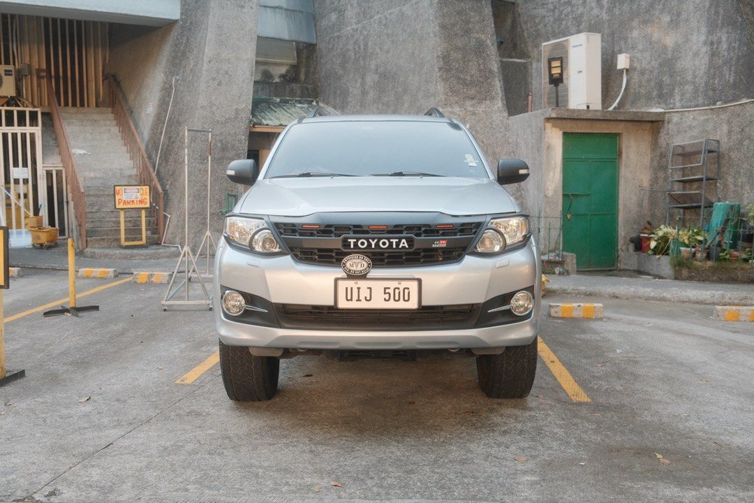 Toyota Fortuner G Auto (Category: Used Cars) located in Quezon City. Submitted by kptcariasosbcm (Listing ID 1470707767, Image 2). Description: TOYOTA FORTUNER 2012 G - Selling my personal car - Owner seller - 2nd owner - Well maintained VEHICLE DETAILS: * Year Model: 2012 * Variant: G * Engine: 2.7L Gasoline * Drivetrain: 4x2 * Transmission: Automatic * Mileage: 110k * Color: Silver Metallic (Original Color - Dark Grey) * Registered until 2027 *