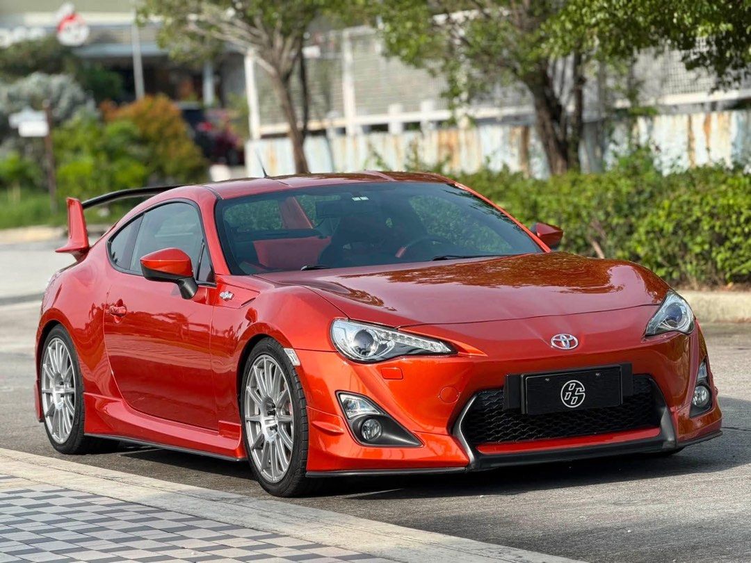 Toyota GT86 Aero Variant Auto (Category: Used Cars) located in Manila. Submitted by quality_cars (Listing ID 1470628288, Image 2). Description: Fresh In‼️ For Sale | Trade-In | Financing Accepted 2013 Toyota GT86 Aero Variant 🍊 Automatic Transmission Mileage: 40k+ Original Mileage Ending Plate: Monday Coding Color: “Lava Orange”/ Orange Metallic Engine: 2.0L Boxer Engine Fuel Type: Gas Upgrades & Features: Original Aero Body Kits from Casa Origi