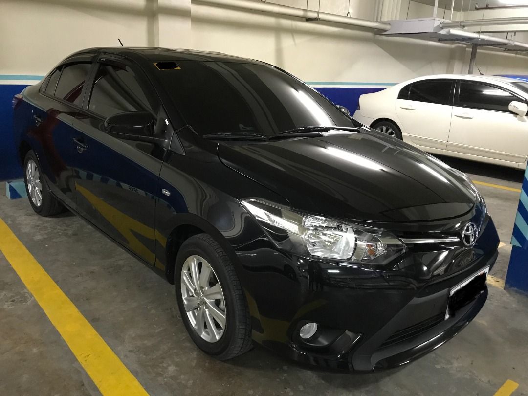 Toyota Vios 1.3 E Auto (Category: Used Cars) located in Quezon City. Submitted by vicdas123 (Listing ID 1470592533, Image 2). Description: VEHICLE DETAILS: • Ultra-low mileage! • Year/Model: 2016 Toyota Vios 1.3 E • Transmission: Automatic (A/T) • Mileage: 45,500 km only • Color: Shiny, deep Original Black • Fuel Type: Gasoline CONDITION & FEATURES: • First owner / Private personal use • Very fresh interior and exterior (Glossy paint, clear headl