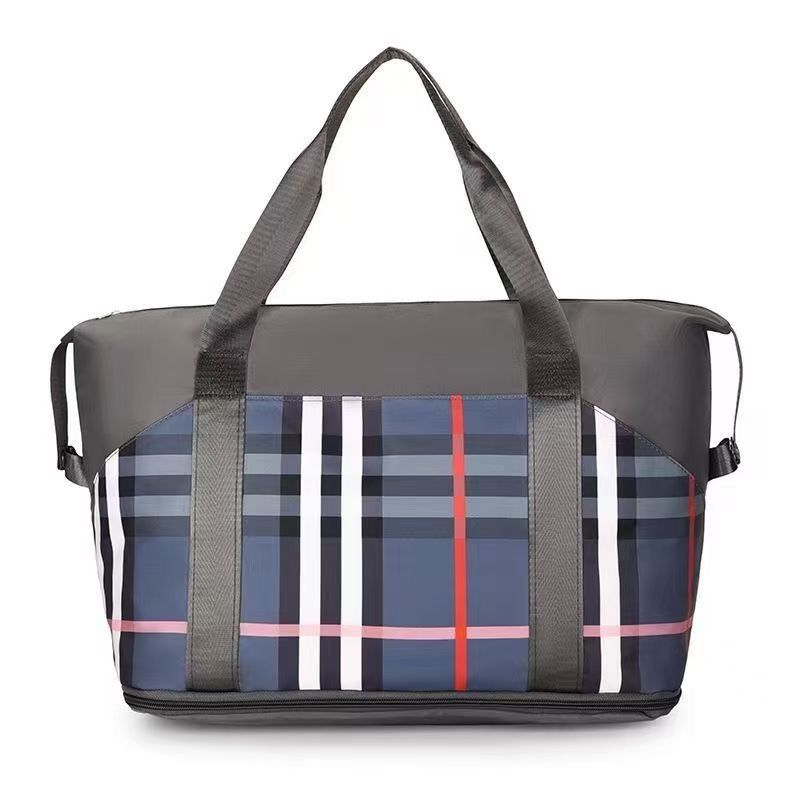 Travel Stripe Duffle Bag Hand Carry (Category: Backpacks) located in Manila. Submitted by townlites (Listing ID 1470568622, Image 2). Description: Lalamove delivery with shipping fee Size: 21 x 22 x 29 cm Closure type: zipper Stripe design Duffle Bag Traveling hand carry bag Brand new Quality product.