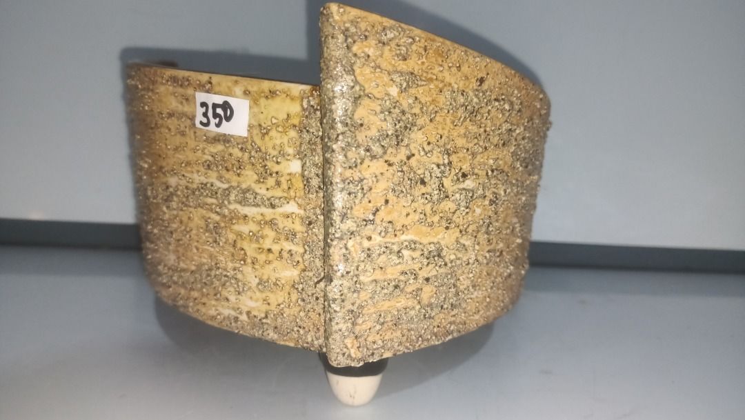 Triangular Ikebana ceramic planter pot with three feet (Category: Pots & Planters) located in Munoz. Submitted by larryc1212 (Listing ID 1470633550, Image 3). Description: - Type: Triangular ceramic planter - Finish: Textured sandy exterior with glossy brown interior - Features: 3 sturdy feet for elevation - Size: Approx. 8 inchesacross the top, 5 incheshigh - Condition: Flawless, no chips or cracks - Ideal for: Succulents and small houseplants D