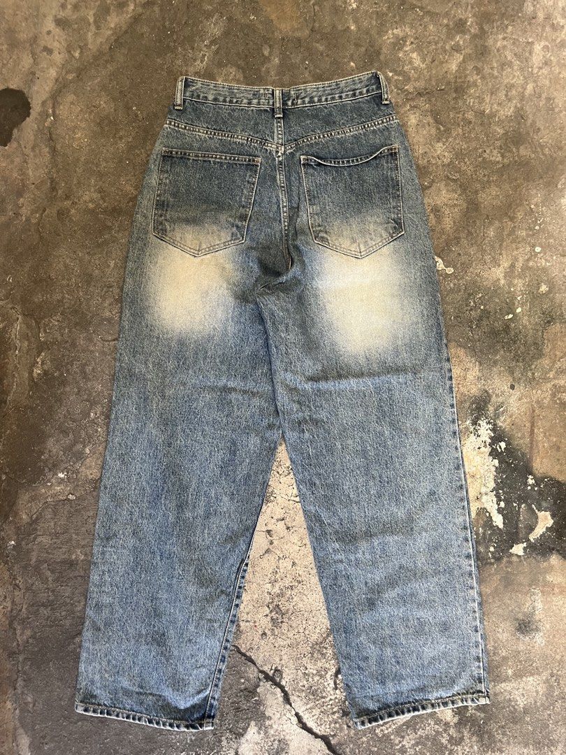 Triple J Sandblasted Baggy Pants (Category: Jeans) located in Iloilo. Submitted by astaaa777 (Listing ID 1470620012, Image 3). Description: 27-28 waist 41 length 9 lo - Brand/Model: Triple J Denim Jeans - Fit/Style: Wide leg silhouette, relaxed fit - Details: Heavy built-in distressing, classic button and zip fly, belt loops - Material: Good weight, durable cotton denim - Condition: Great pre-loved/ready to wear (as applicable).