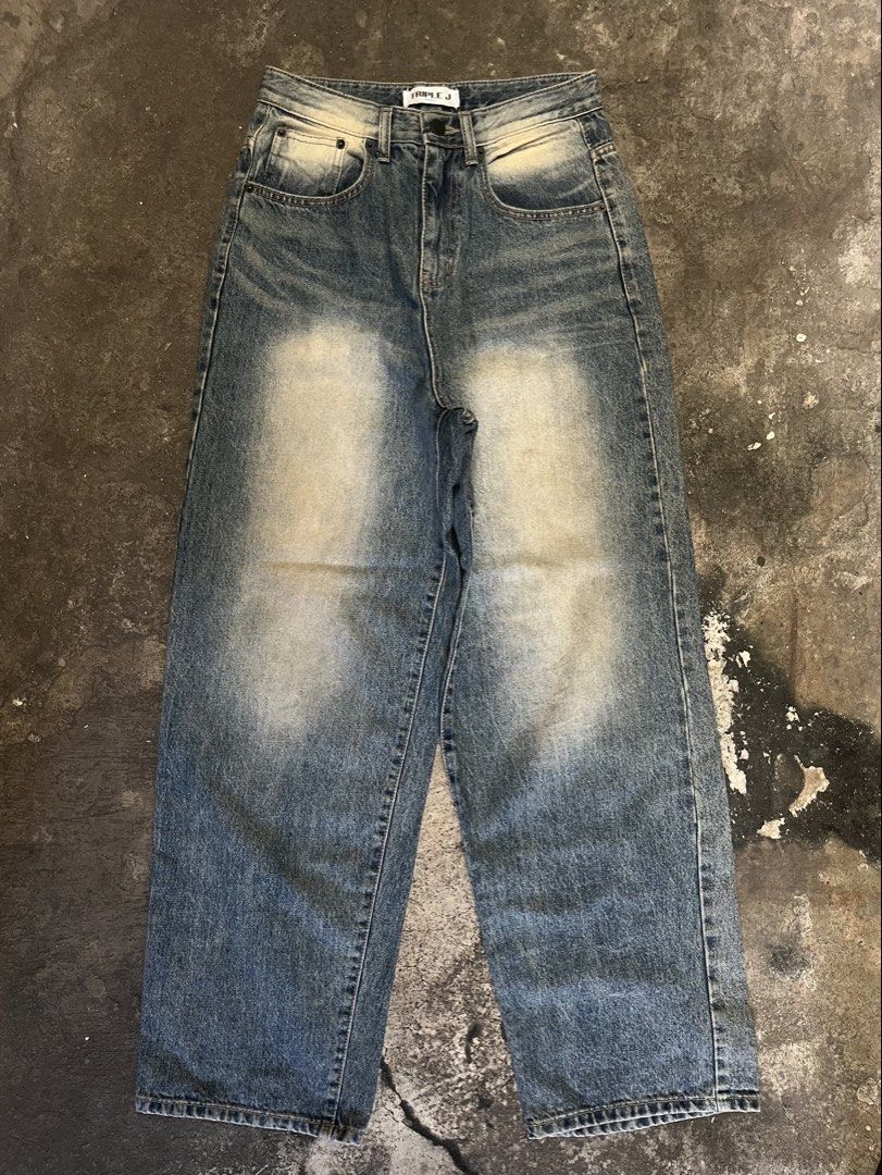 Triple J Sandblasted Baggy Pants (Category: Jeans) located in Iloilo. Submitted by astaaa777 (Listing ID 1470620012, Image 1). Description: 27-28 waist 41 length 9 lo - Brand/Model: Triple J Denim Jeans - Fit/Style: Wide leg silhouette, relaxed fit - Details: Heavy built-in distressing, classic button and zip fly, belt loops - Material: Good weight, durable cotton denim - Condition: Great pre-loved/ready to wear (as applicable).