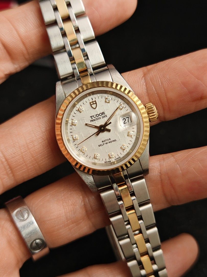 Tudor Princess Date 26mm (Category: Women's Watches) located in San Juan City. Submitted by MW_888 (Listing ID 1470683982, Image 2). Description: Tudor Princess Date 26mm Linen dial with 10P factory diamonds Gold bezel, crown and inner links Ref 92413 9/10 condition Inclusions: watch, original bracelet fit to approx 6.5" wrist and watch case *photo reference on 6.5" wrist *tight bracelet (see photo) 110k.