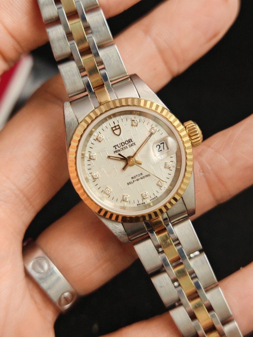 Tudor Princess Date 26mm (Category: Women's Watches) located in San Juan City. Submitted by MW_888 (Listing ID 1470683982, Image 3). Description: Tudor Princess Date 26mm Linen dial with 10P factory diamonds Gold bezel, crown and inner links Ref 92413 9/10 condition Inclusions: watch, original bracelet fit to approx 6.5" wrist and watch case *photo reference on 6.5" wrist *tight bracelet (see photo) 110k.