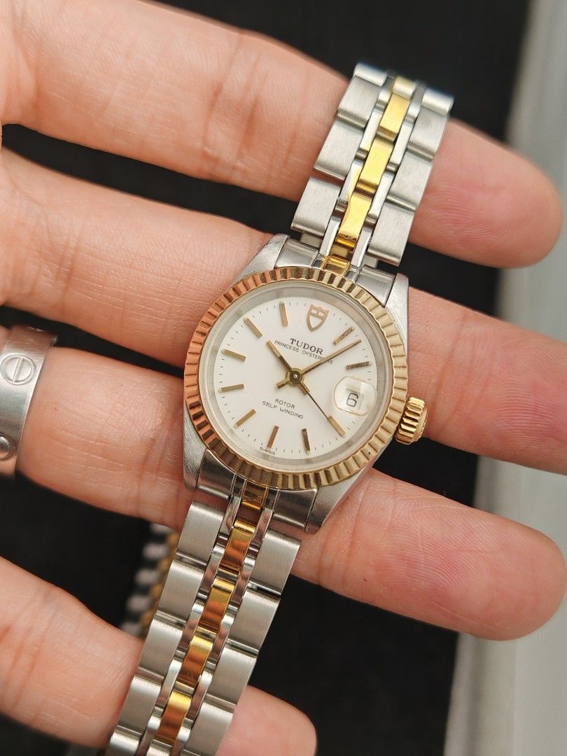 Tudor Princess Date 26mm (Category: Women's Watches) located in San Juan City. Submitted by MW_888 (Listing ID 1470689904, Image 1). Description: Tudor Princess Date 26mm Original Rolex caseback and Rolex crown White dial Two tone (Solid gold bezel) Ref 92413N B serial, 1993 both watch head and bracelet - period correct 8.5/10 condition Inclusions: watch, original Tudor bracelet fit to approx 7.8" wrist (with stretch consistent to age) and watch 