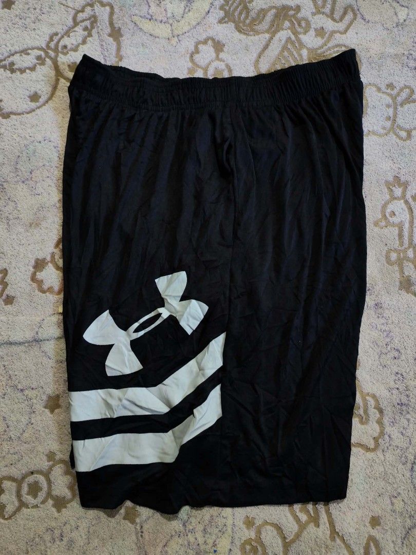 Under Armour Black Athletic Shorts with White Logo (Category: Shorts) located in Sipalay. Submitted by boldowl.e4f283 (Listing ID 1470571812, Image 2). Description: - Brand: Under Armour - Color: Black - Fit: Comfortable elastic waistband - Design: Large white UA logo with two horizontal white stripes on the right leg - Material: Lightweight fabric ideal for workouts and casual wear - Condition: Clean and ready to use.