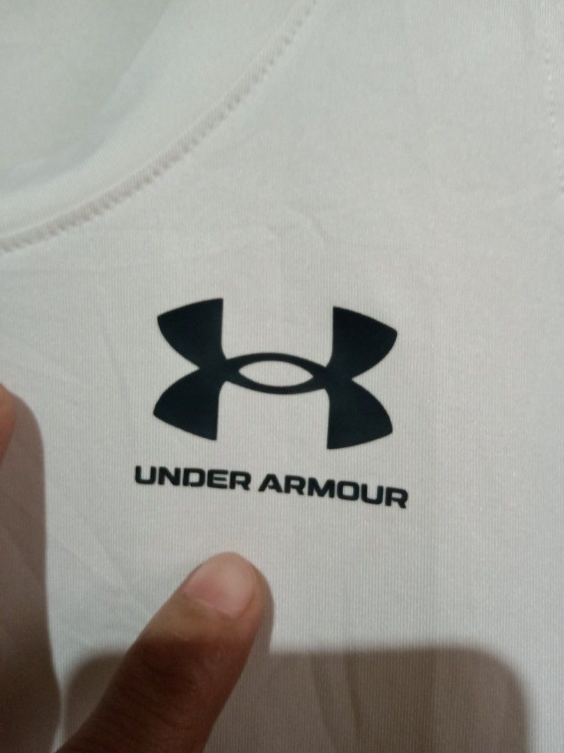 Under Armour HeatGear Compression Tank Top (Category: Activewear) located in Manila. Submitted by tres0824 (Listing ID 1470609561, Image 2). Description: Under Armour Heatgear Compression Tank Top Size medium 16-19" width 25" length Excellent condition No issue 350 + Shipping fee Taguig location Dm to purchase📩 .