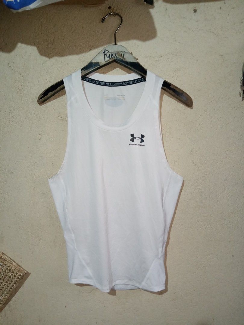 Under Armour HeatGear Compression Tank Top (Category: Activewear) located in Manila. Submitted by tres0824 (Listing ID 1470609561, Image 1). Description: Under Armour Heatgear Compression Tank Top Size medium 16-19" width 25" length Excellent condition No issue 350 + Shipping fee Taguig location Dm to purchase📩 .