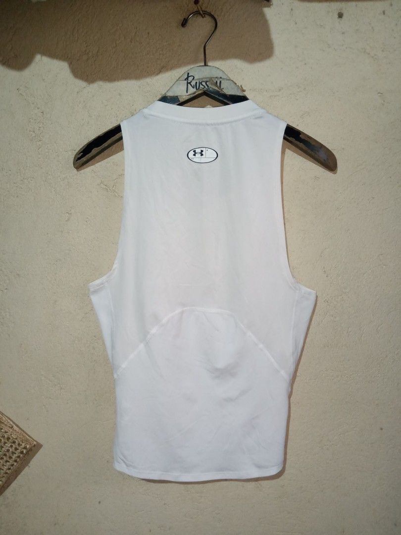 Under Armour HeatGear Compression Tank Top (Category: Activewear) located in Manila. Submitted by tres0824 (Listing ID 1470609561, Image 3). Description: Under Armour Heatgear Compression Tank Top Size medium 16-19" width 25" length Excellent condition No issue 350 + Shipping fee Taguig location Dm to purchase📩 .