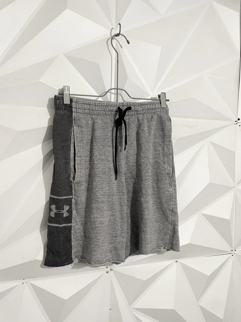 Under Armour HeatGear Grey Shorts (Category: Shorts) located in Cabuyao City. Submitted by ParadisethriftedPh (Listing ID 1470648374, Image 2). Description: Cr: 9.5/10 Dimensions Waist: 26-32 Lenght: 18.5 - Brand: Under Armour - Size: Small - Fit: Loose fit, lightweight HeatGear fabric - Color: Grey with contrast dark grey side panel and logo - Features: Black drawstring waist, side pockets, raw cut hem - Condition: Great for workouts or lounging