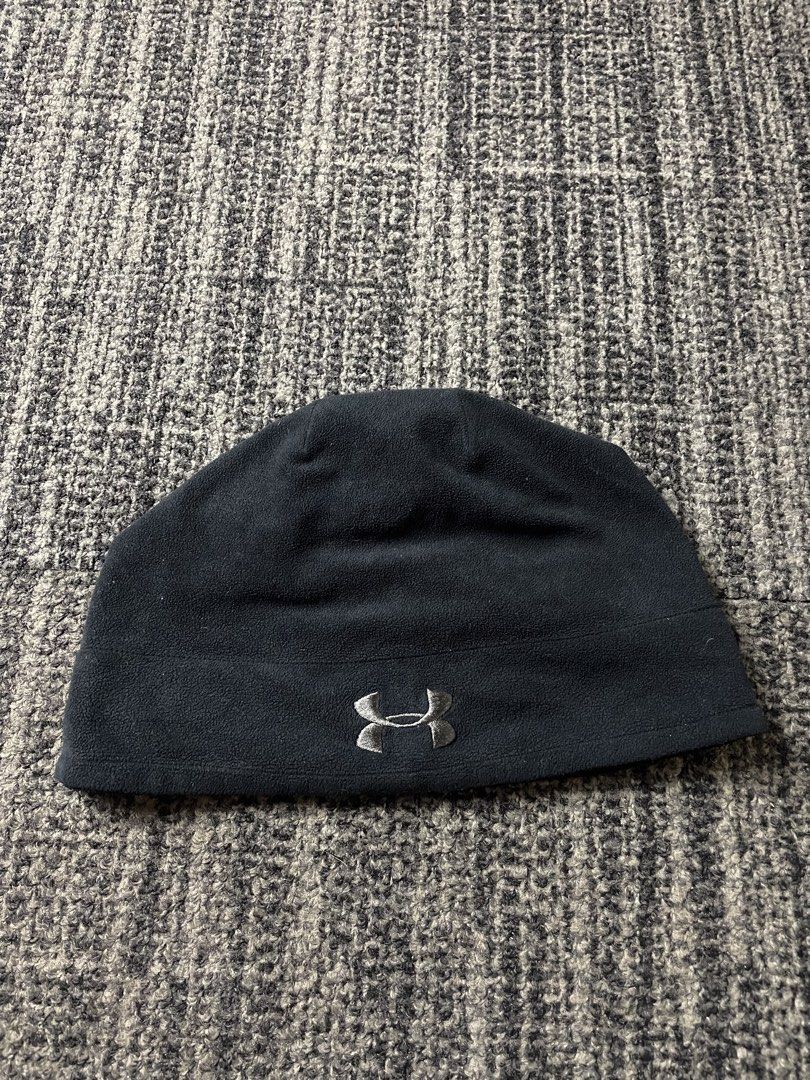 Under Armour Storm Fleece Beanie Black (Category: Caps & Hats) located in Manila. Submitted by rdtp2 (Listing ID 1470584746, Image 1). Description: - Brand: Under Armour - Color: Black - Material: Soft fleece fabric (blocks wind and holds warmth) - Details: Embroidered logo on front and Storm wordmark near hem - Size: Measures approx. 11 inches across (laid flat) - Condition: Great cold weather hat, inner tag has completely faded from use - Best 