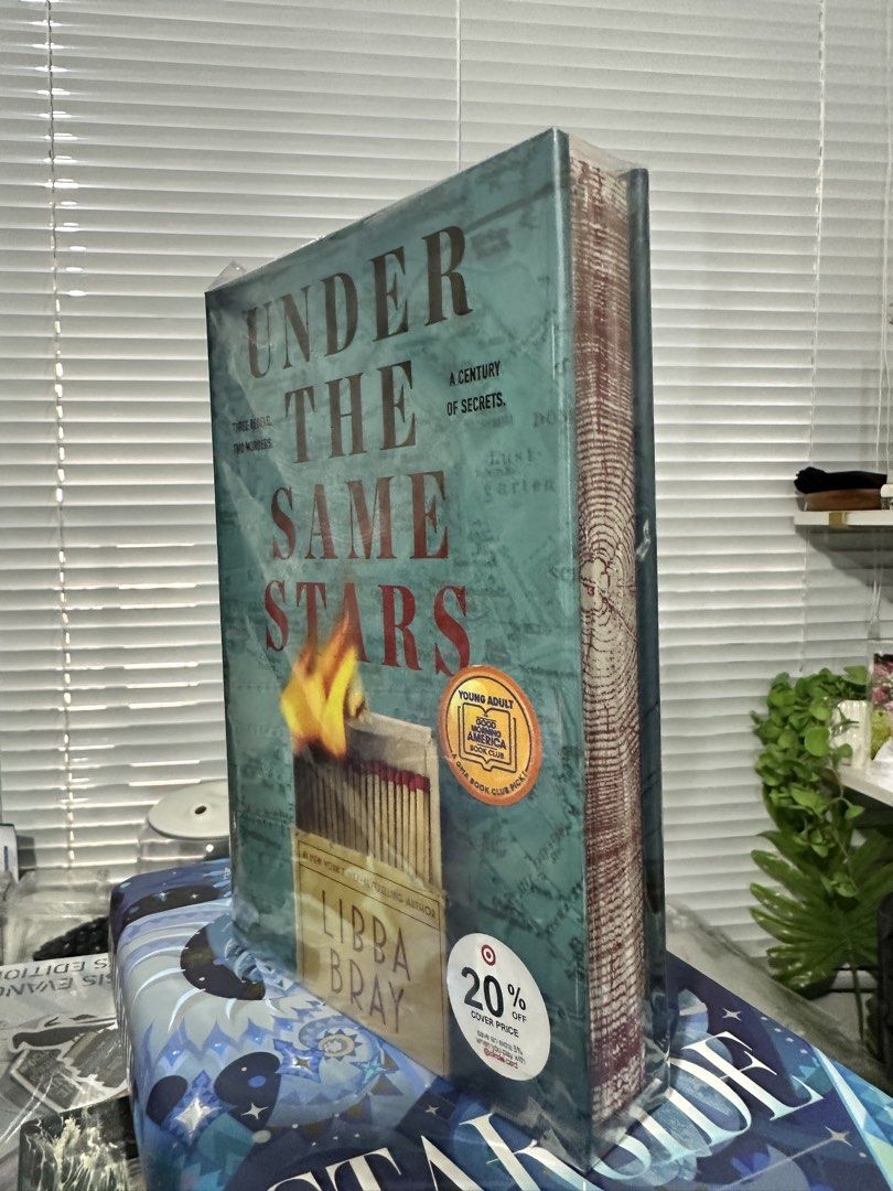 Under the Same Stars by Libba Bray Special Edition (Category: Storybooks) located in Paranaque City. Submitted by chikugo (Listing ID 1470614048, Image 1). Description: - Title: Under the Same Stars by Libba Bray - Format: Hardcover (Special Edition) - Features: Sprayed edges and custom cover design - Condition: Brand new Remaindered Copy - Extras: YA book club pick with 20% off Target sticker on front - Perfect for collectors and YA fans! Locati