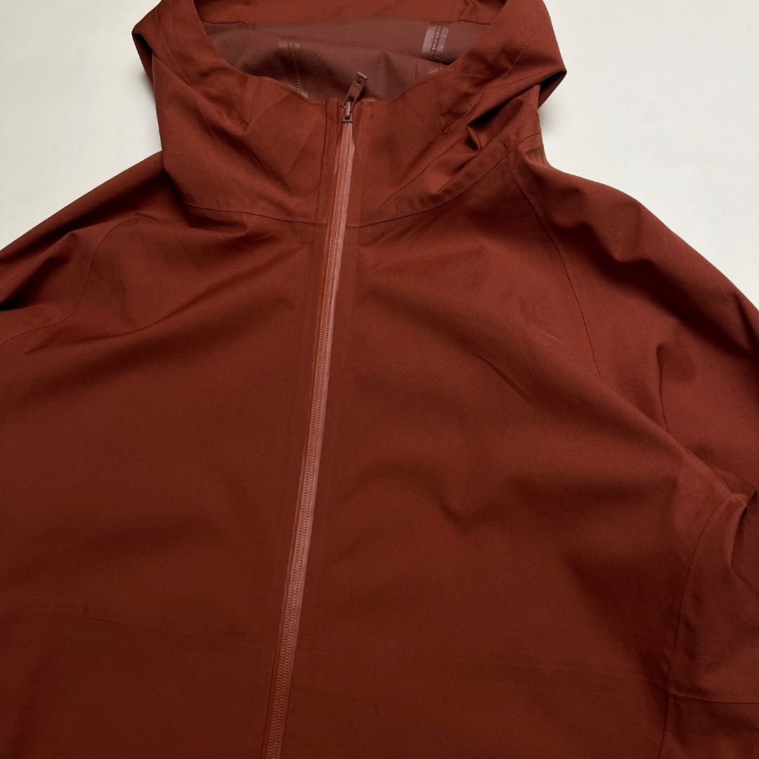 Uniqlo Blocktech Jacket Rust Orange XL (Category: Coats, Jackets and Outerwear) located in Caloocan City. Submitted by achilles_grails (Listing ID 1470565290, Image 2). Description: - Brand: Uniqlo BLOCKTECH - Color: Rich rust orange - Size: XL (Fits chest 104-112cm, height 175-185cm) - Material: 100% polyester (with 50% recycled polyester fiber) - Features: Waterproof, windproof, attached hood, full front zip, and adjustable drawcords - Construc