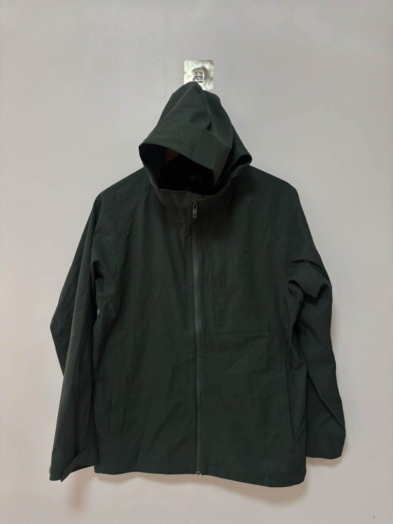 Uniqlo Blocktech Parka Dark Green (Category: Coats, Jackets and Outerwear) located in Mabalacat. Submitted by cjpacleb (Listing ID 1470576728, Image 3). Description: - Brand: Uniqlo - Color: Dark green - Style: Hooded parka with full zip front - Material: Waterproof / water-resistant - Pockets: Convenient chest and side pockets - Condition: Clean inside and out - Ideal for: Rainy days and outdoor activities.