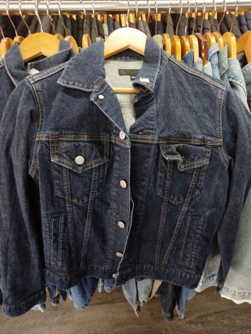 Uniqlo Dark Blue Denim Jacket Size S (Category: Coats, Jackets and Outerwear) located in Quezon City. Submitted by epoquebyjaz (Listing ID 1470639172, Image 2). Description: - Brand: Uniqlo - Size: S - Color: Dark blue / indigo wash - Material: Heavy cotton denim - Features: Classic button-up front, metallic buttons, two chest flap pockets, and vertical front panel stitching - Condition: Brand new with tag attached on sleeve cuff.